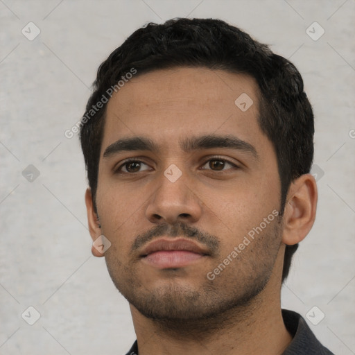 Neutral white young-adult male with short  black hair and brown eyes