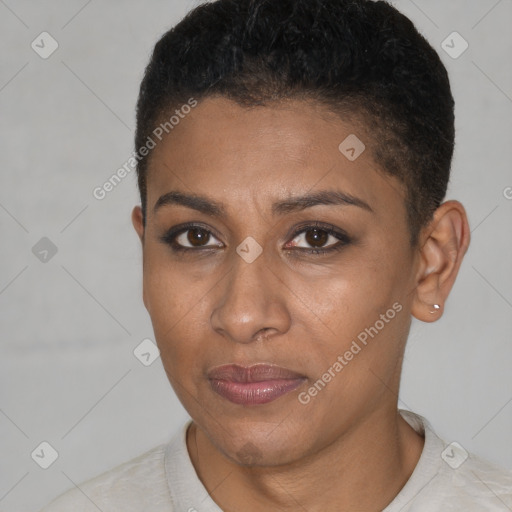 Joyful black young-adult female with short  brown hair and brown eyes