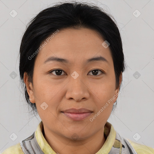 Joyful asian young-adult female with medium  brown hair and brown eyes