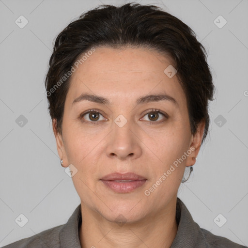 Joyful white adult female with short  brown hair and brown eyes