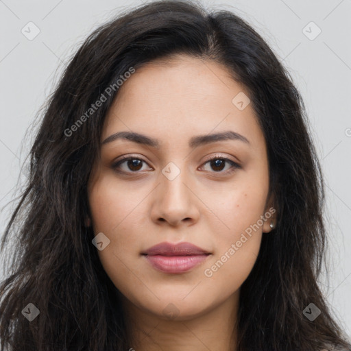 Joyful latino young-adult female with long  brown hair and brown eyes