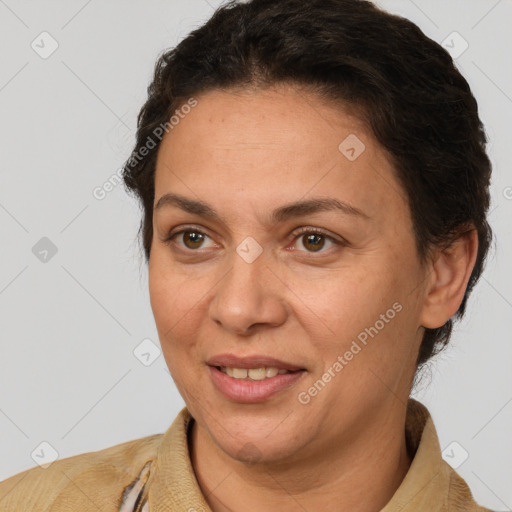 Joyful white adult female with short  brown hair and brown eyes