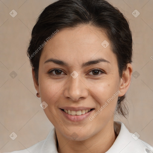 Joyful white adult female with medium  brown hair and brown eyes