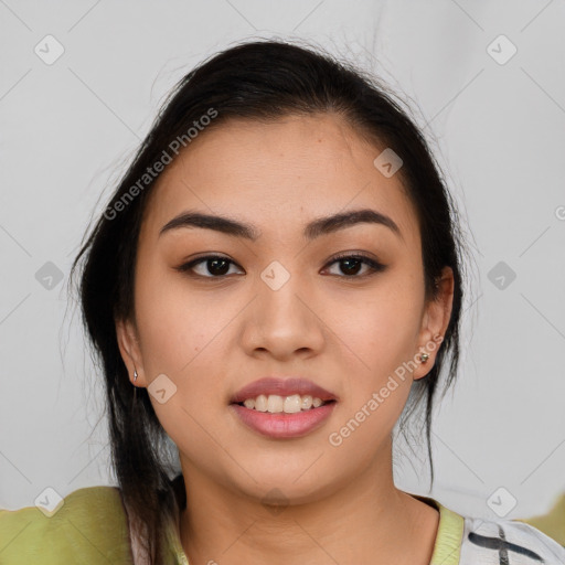 Joyful latino young-adult female with medium  brown hair and brown eyes