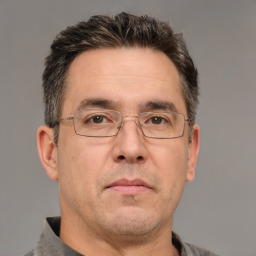 Neutral white adult male with short  brown hair and brown eyes