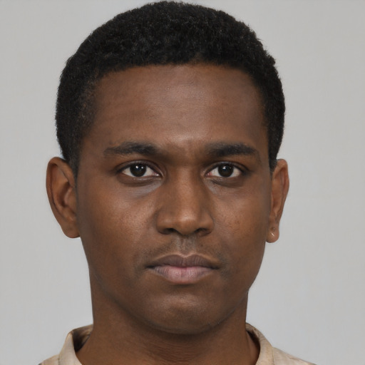 Neutral black young-adult male with short  brown hair and brown eyes