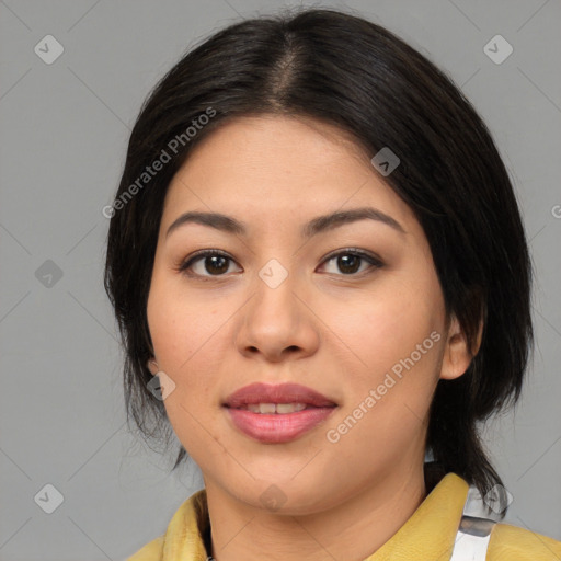 Joyful asian young-adult female with medium  black hair and brown eyes