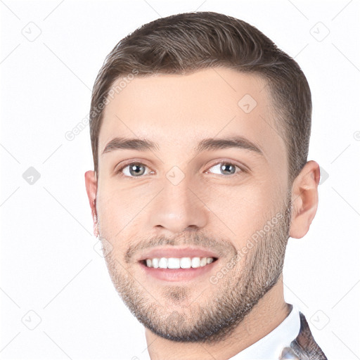 Joyful white young-adult male with short  brown hair and grey eyes