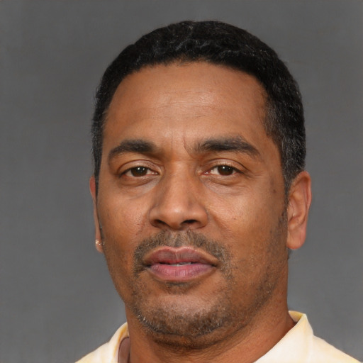 Neutral latino adult male with short  black hair and brown eyes