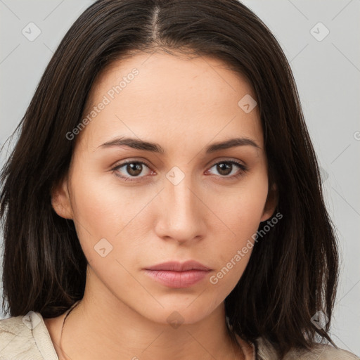 Neutral white young-adult female with medium  brown hair and brown eyes