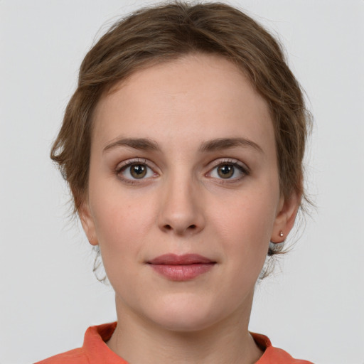 Neutral white young-adult female with medium  brown hair and grey eyes