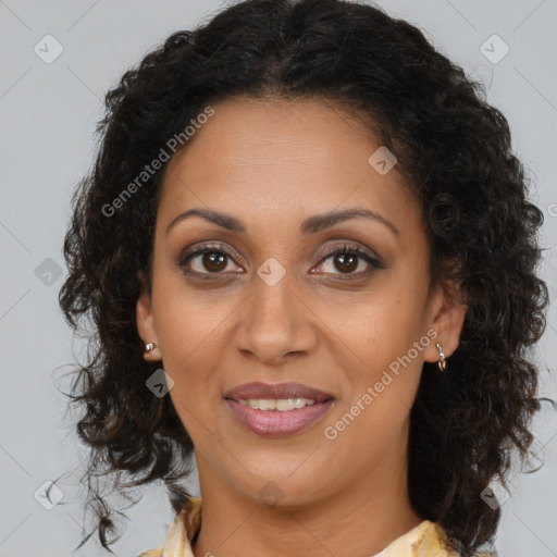 Joyful black young-adult female with medium  brown hair and brown eyes