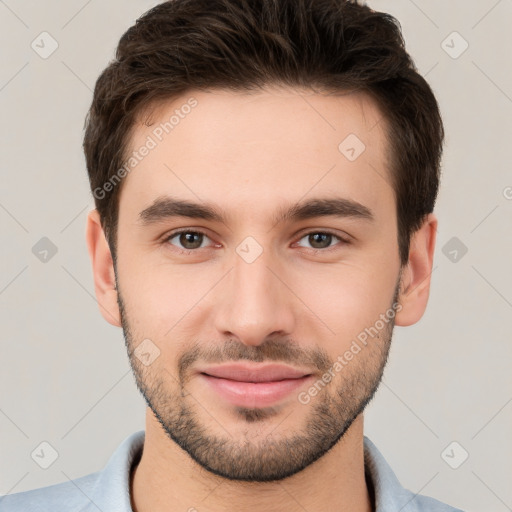 Joyful white young-adult male with short  brown hair and brown eyes