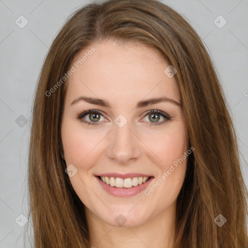 Joyful white young-adult female with long  brown hair and green eyes