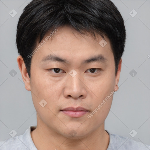Neutral asian young-adult male with short  black hair and brown eyes