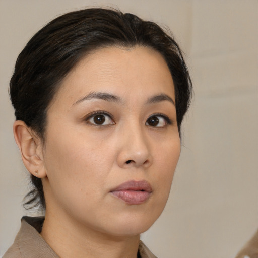 Neutral white young-adult female with medium  brown hair and brown eyes
