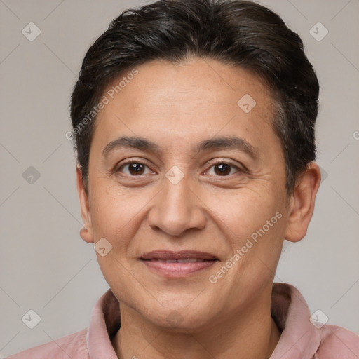 Joyful white adult female with short  brown hair and brown eyes