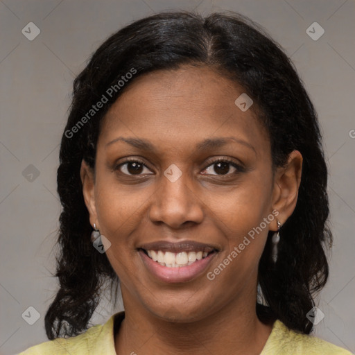 Joyful black young-adult female with medium  brown hair and brown eyes