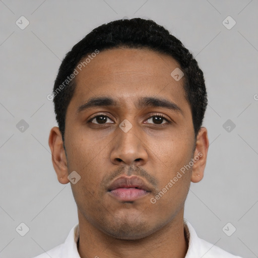 Neutral latino young-adult male with short  black hair and brown eyes