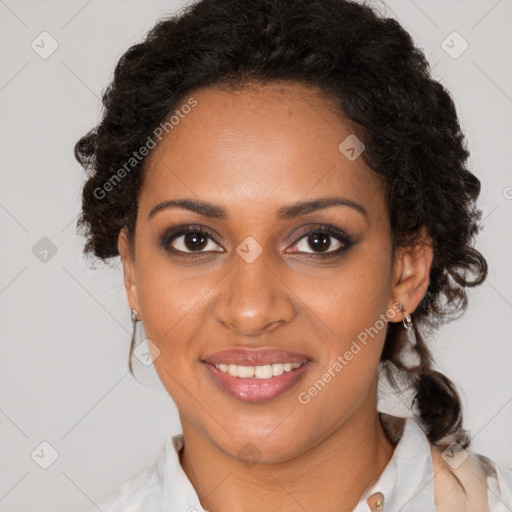 Joyful black young-adult female with medium  brown hair and brown eyes