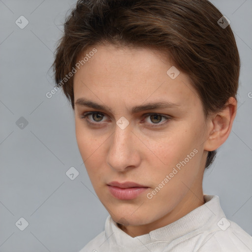 Neutral white young-adult female with short  brown hair and brown eyes