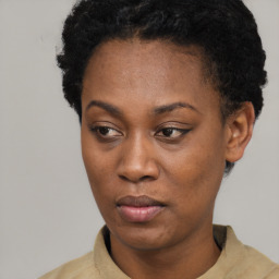 Neutral black young-adult female with short  black hair and brown eyes