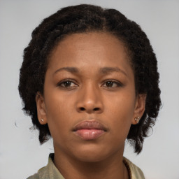 Neutral black young-adult female with short  brown hair and brown eyes