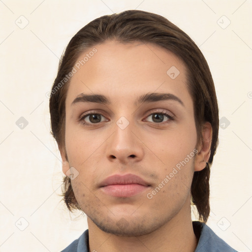 Neutral white young-adult male with short  brown hair and brown eyes