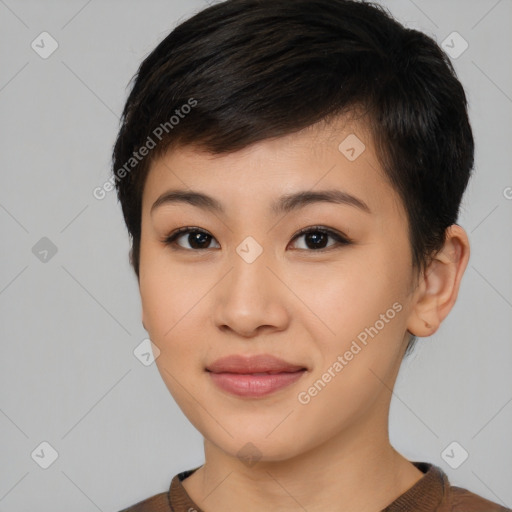 Joyful asian young-adult female with short  black hair and brown eyes