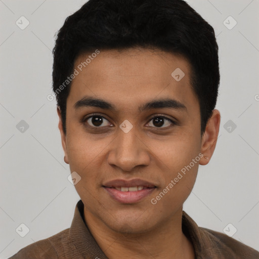 Joyful latino young-adult male with short  black hair and brown eyes