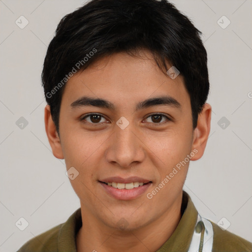 Joyful asian young-adult male with short  brown hair and brown eyes