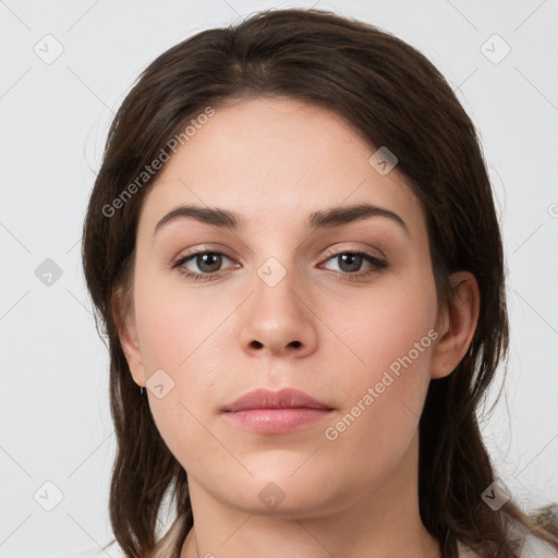 Neutral white young-adult female with medium  brown hair and grey eyes