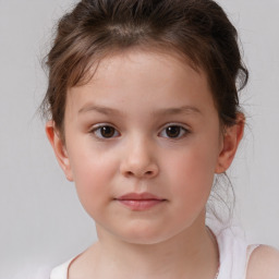 Neutral white child female with short  brown hair and brown eyes