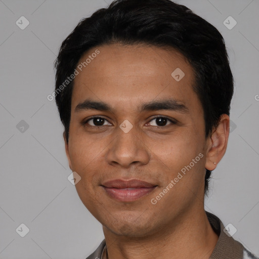 Joyful latino young-adult male with short  black hair and brown eyes