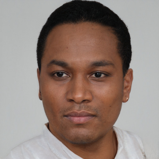Neutral black young-adult male with short  black hair and brown eyes