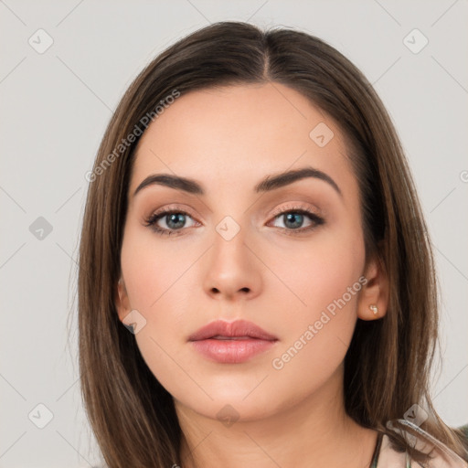 Neutral white young-adult female with long  brown hair and brown eyes