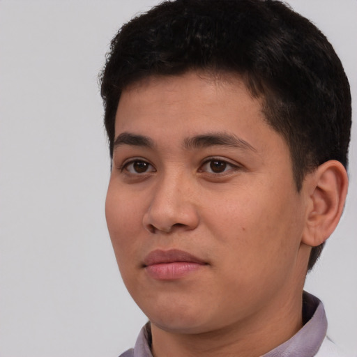 Neutral white young-adult male with short  black hair and brown eyes