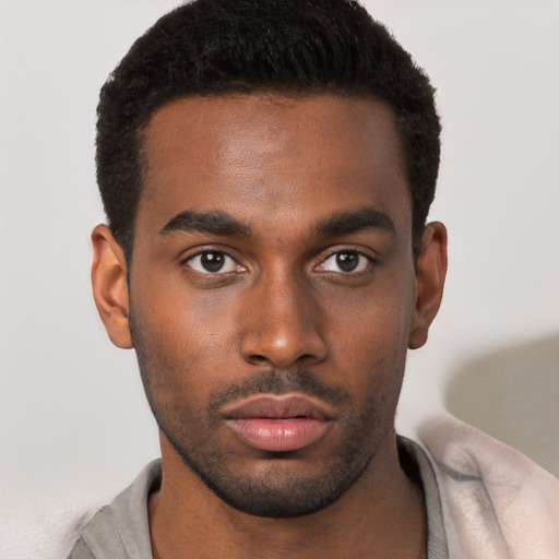 Neutral black young-adult male with short  brown hair and brown eyes