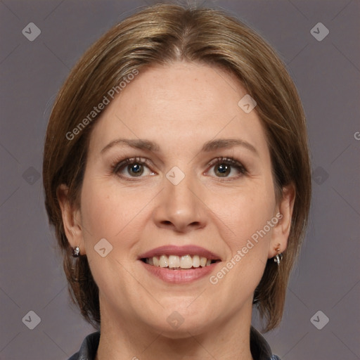 Joyful white adult female with medium  brown hair and grey eyes