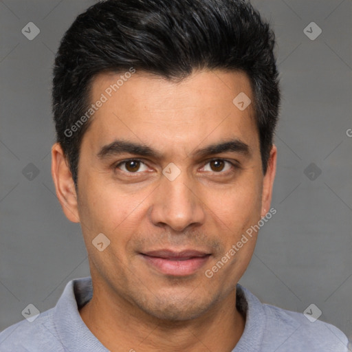 Joyful white young-adult male with short  black hair and brown eyes