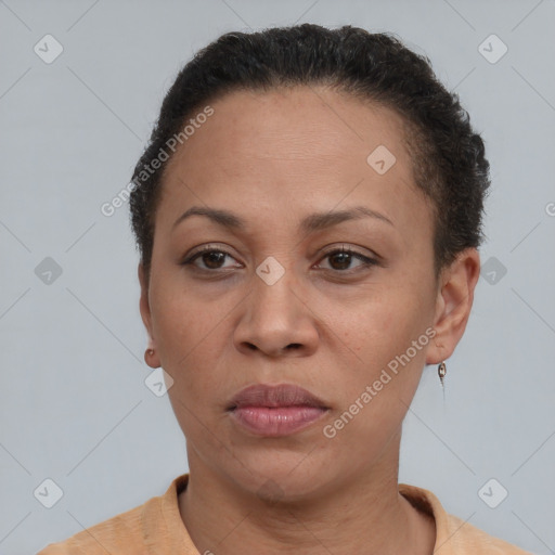 Neutral black adult female with short  brown hair and brown eyes