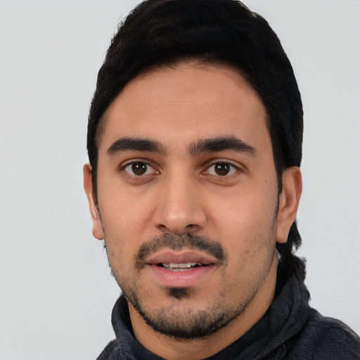 Neutral latino young-adult male with short  black hair and brown eyes
