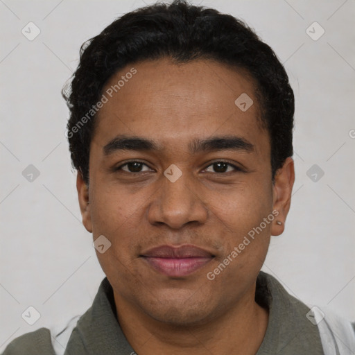 Joyful latino young-adult male with short  black hair and brown eyes