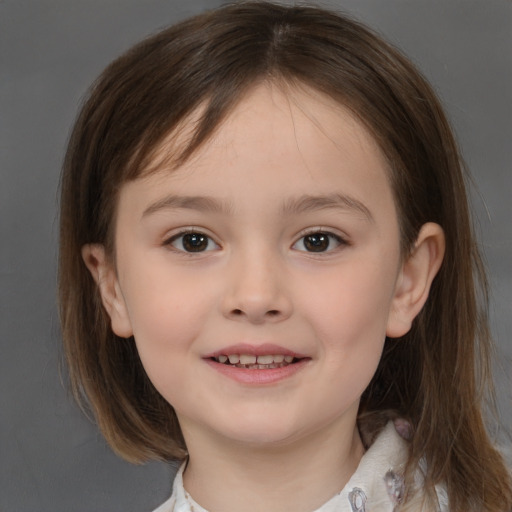 Joyful white child female with medium  brown hair and brown eyes