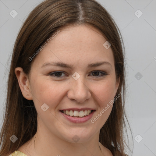 Joyful white young-adult female with medium  brown hair and brown eyes