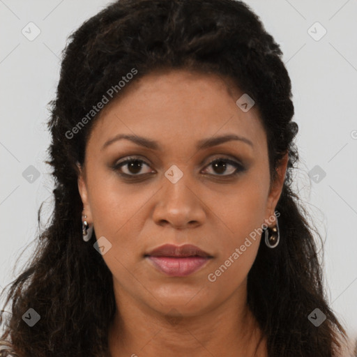 Joyful black young-adult female with long  brown hair and brown eyes