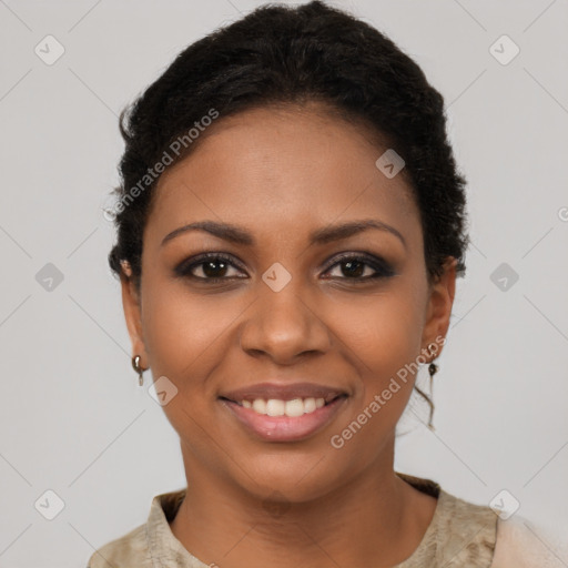 Joyful black young-adult female with short  brown hair and brown eyes