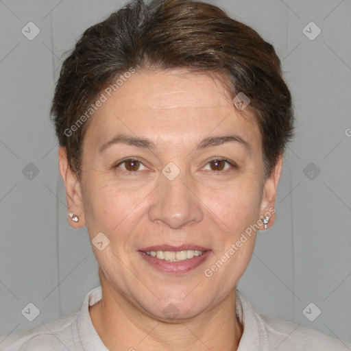 Joyful white adult female with short  brown hair and brown eyes