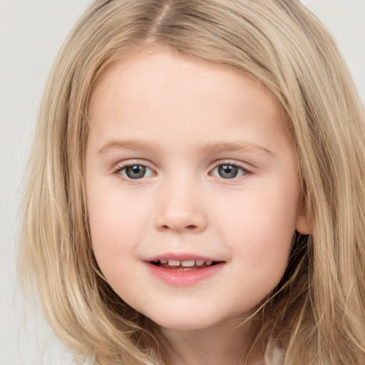 Joyful white child female with long  brown hair and brown eyes