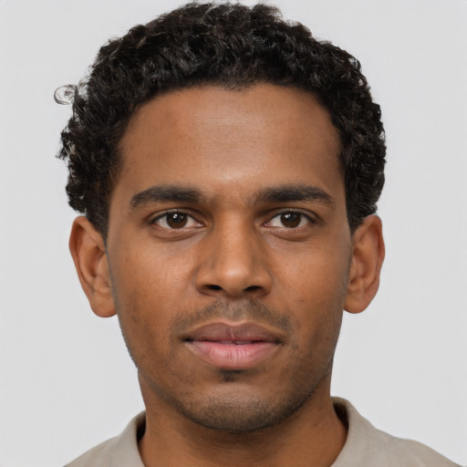 Neutral black young-adult male with short  brown hair and brown eyes